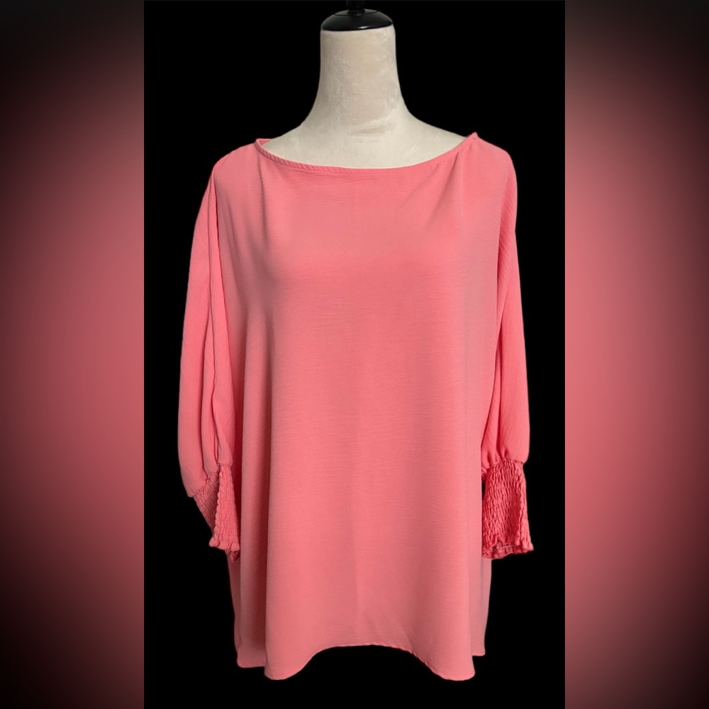 Women’s comfy/flowy peachish-pink wide neck shirt. 3/4 Elastic sleeves.